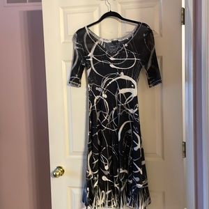 Komarov, woman’s black and white dress. Gently used, size small